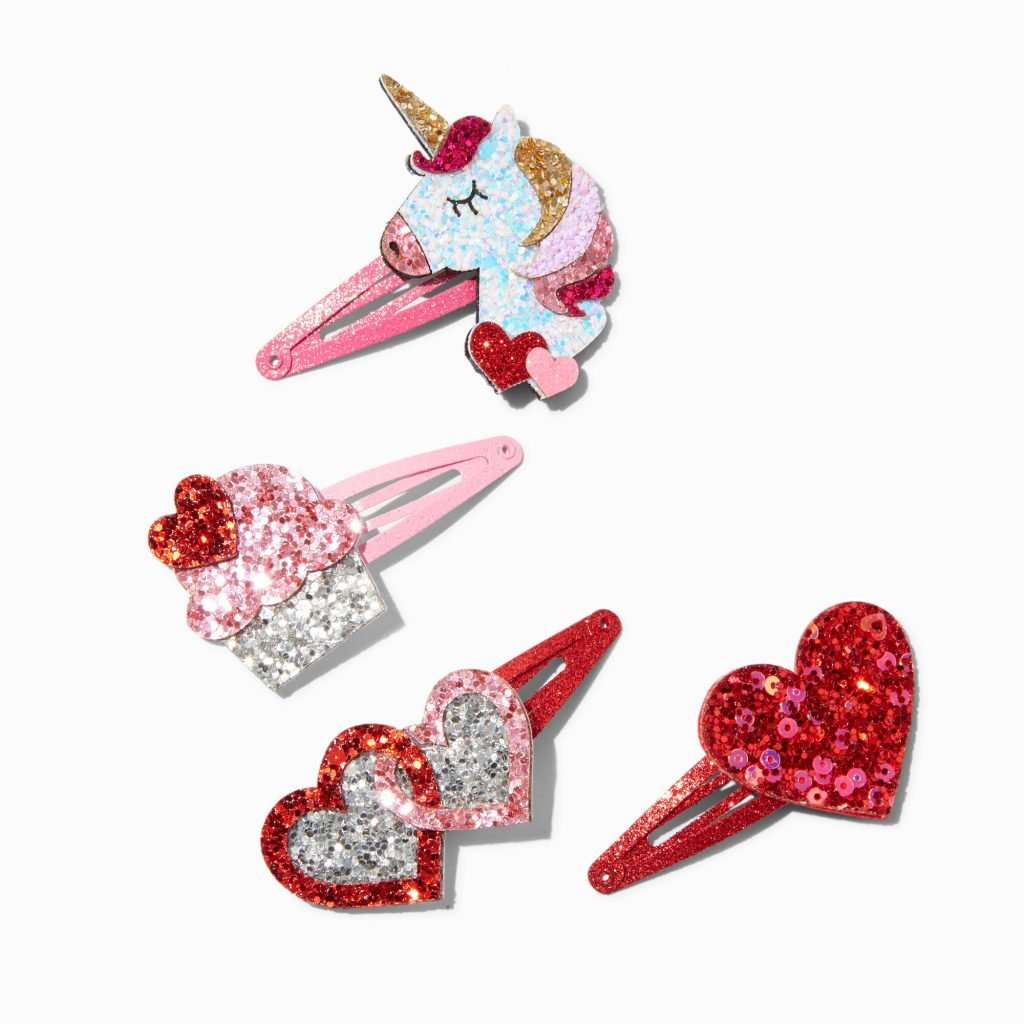 img src="hairclips.png" alt="pink and red with unicorn and heart shape hair clips" 