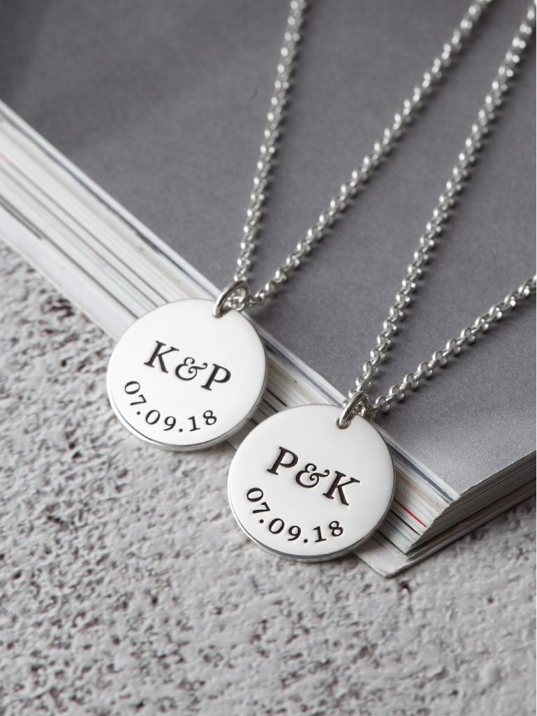 img src="necklace.png" alt="initials and date couple necklace necklace in sterling silver"
