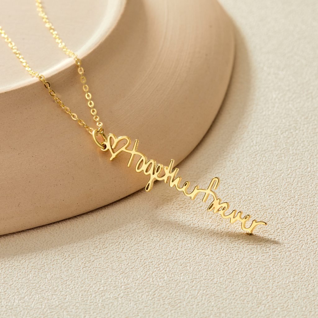 img src="necklace.png" alt="meaningful handwriting necklace in sterling silver yellow or rose gold"